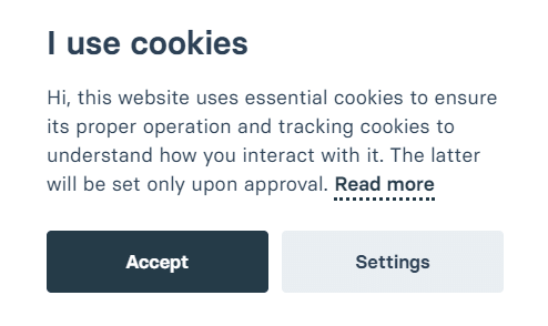 A cookie consent prompt informing the user that the website uses essential cookies to ensure proper operation and track interaction, with options to "Accept" or go to "Settings."