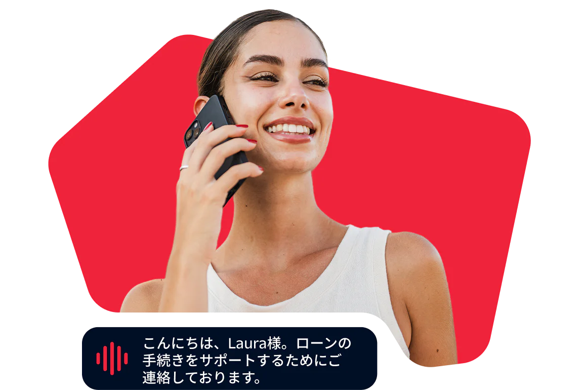 Woman on a phone call offering loan assistance Woman smiling while talking on the phone about a loan process