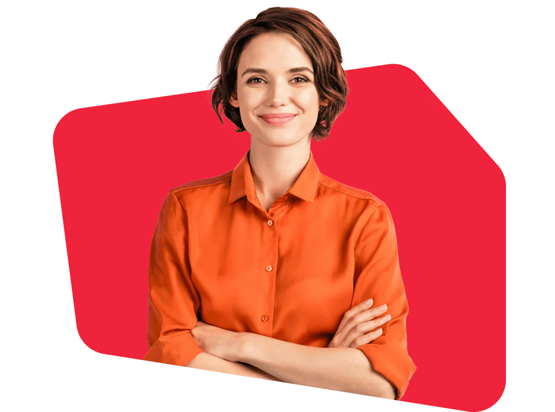Confident Woman in Orange Shirt on a Red Background Woman wearing an orange shirt stands confidently with arms crossed against a red background.