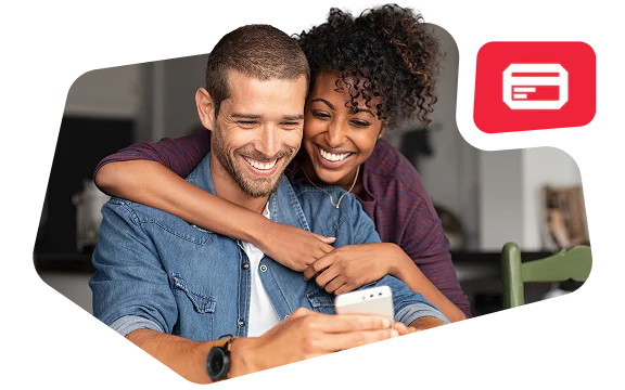 Smiling couple looking at a phone with a red card icon in the background.