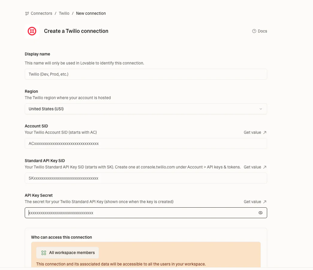 Twilio connection setup interface in Lovable with fields for SID, API Key, secret, and access permissions.