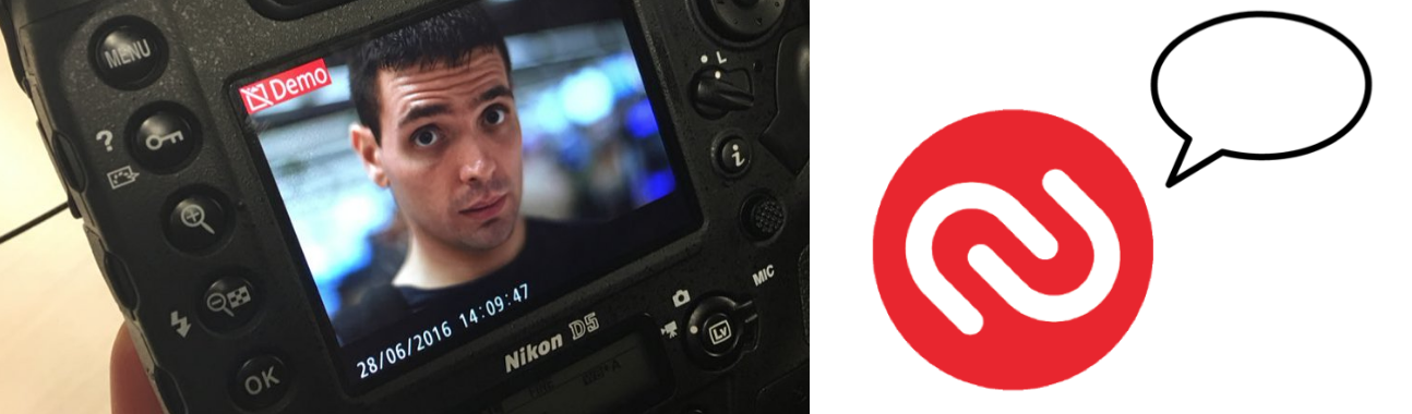 Close-up of a Nikon camera screen showing a man’s face, beside a red logo with a speech bubble.