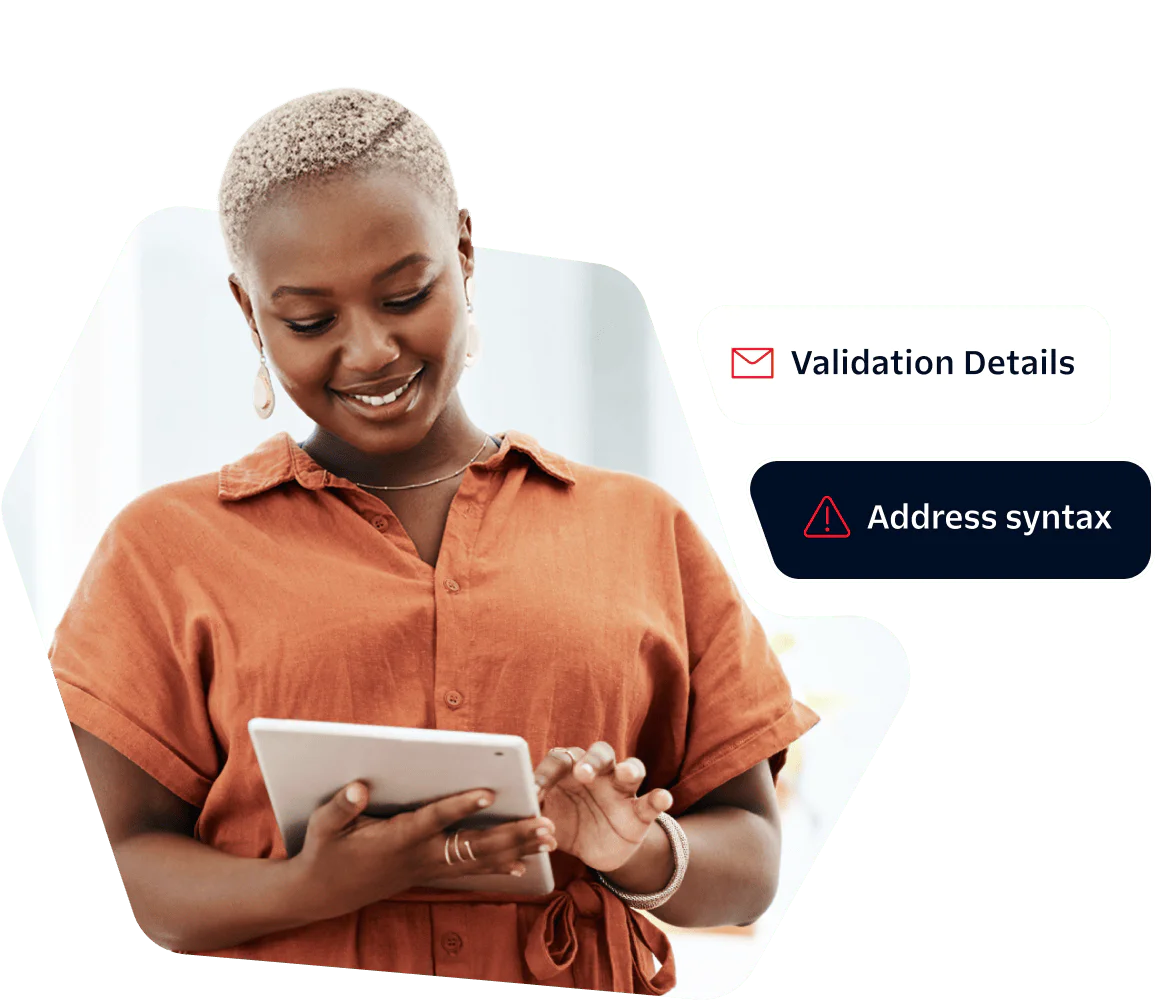 Woman in orange shirt smiles while using a tablet, validation details and address syntax shown.