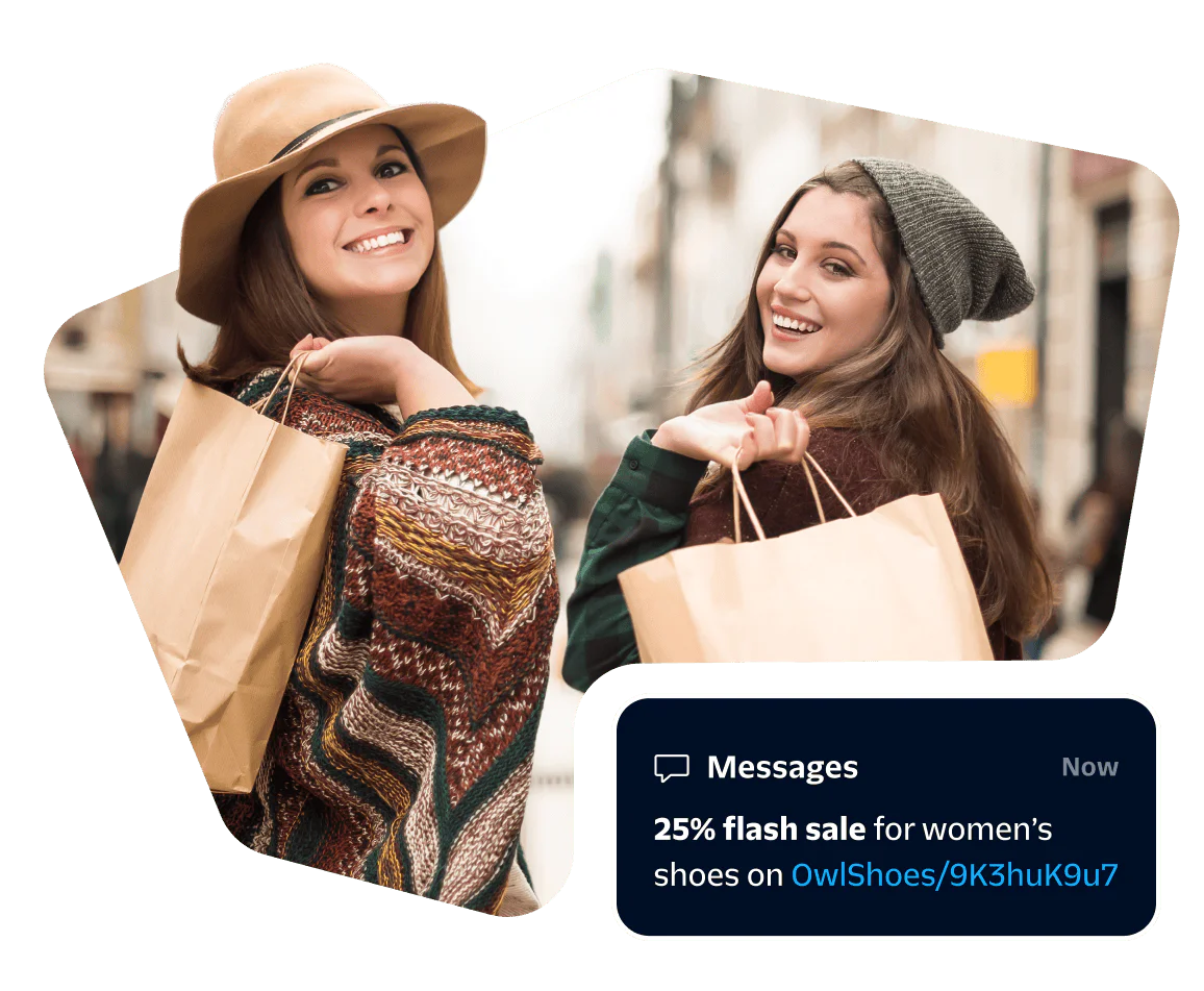 Women Shopping with Discount Offer on Shoes Two smiling women shopping with discount offer pop-up for women's shoes.