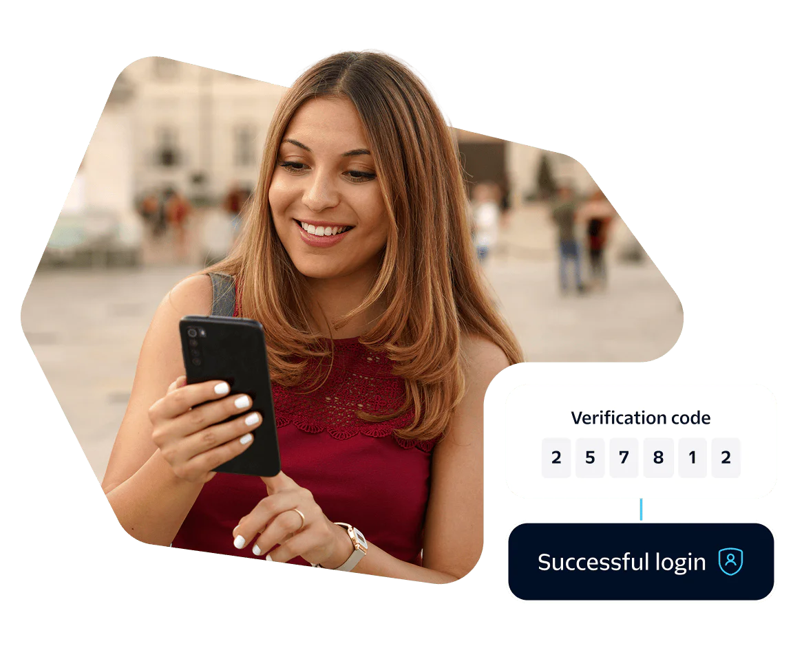 Woman entering verification code on smartphone with a Successful login message displayed.