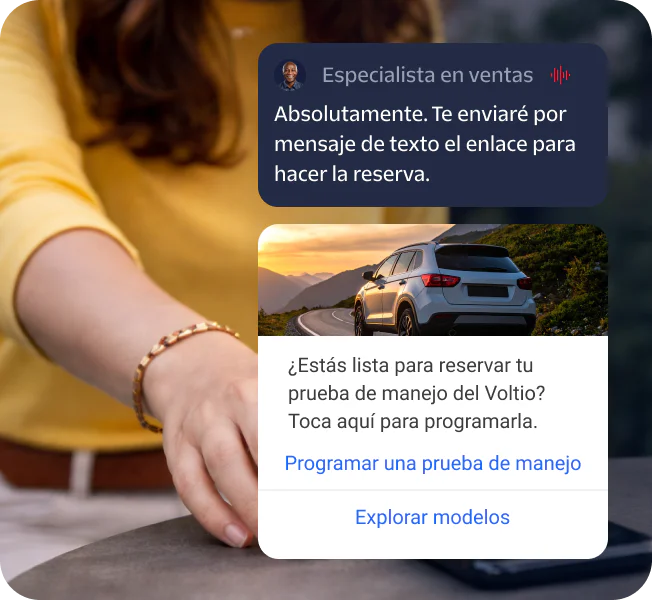 Person touching a phone with a booking link message and a car demo drive scheduling prompt.