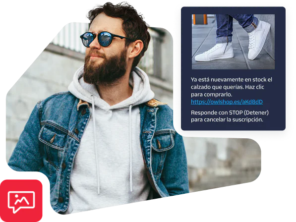 Man in denim jacket and sunglasses with phone text about shoes being back in stock.