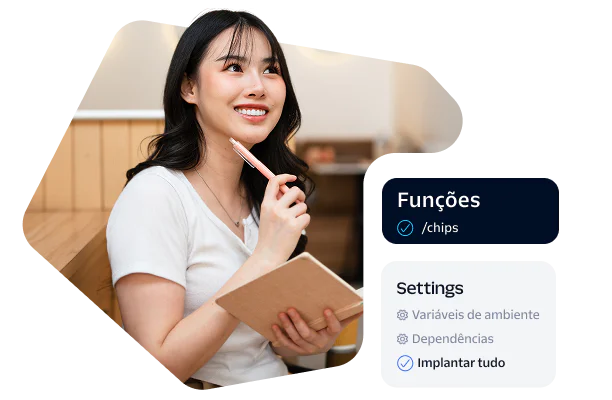 Woman holding a notebook and pen, sitting in a workspace with development settings on the side.